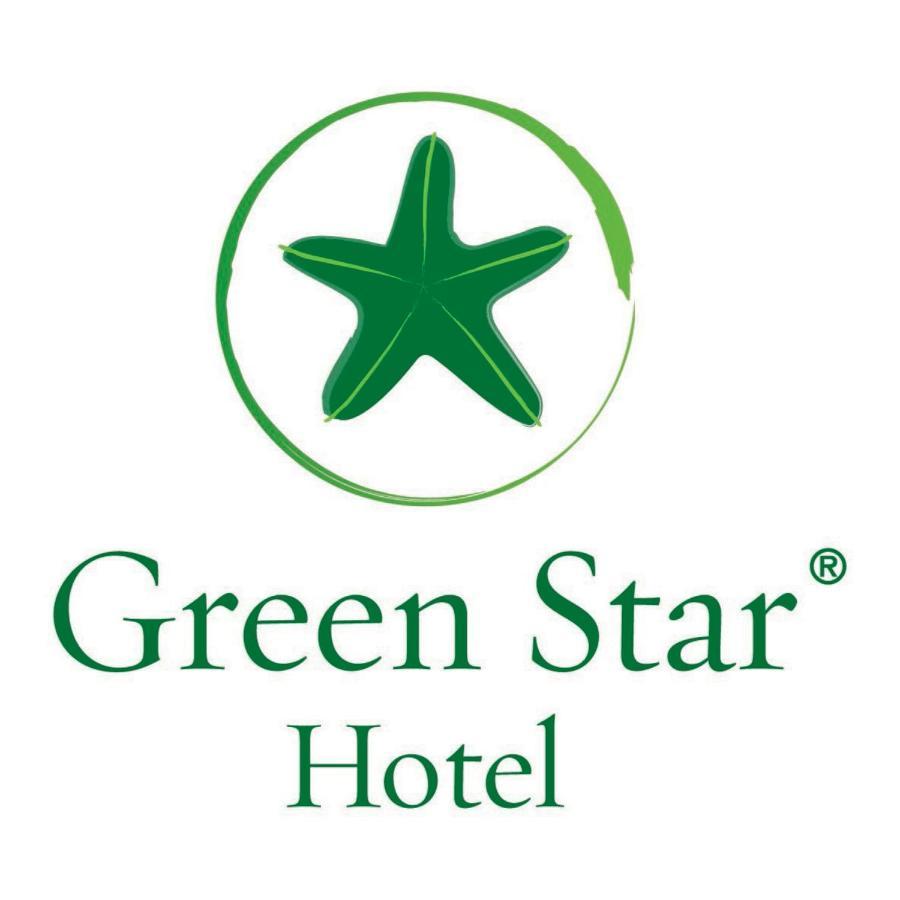 Safir Hotel Cairo Giza Exterior foto The image shows the logo of "Green Star Hotel." It features a green star, likely a stylized sea star, positioned above the text. The name "Green Star" is displayed prominently, with "Hotel" underneath it, all in a clean and simple font. The overall d